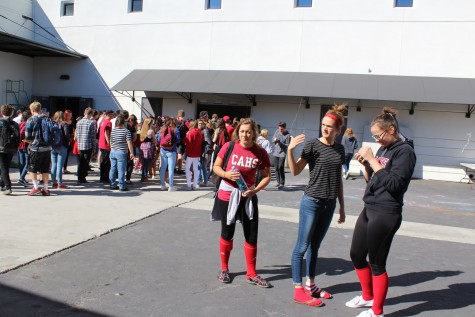 Seniors Abigail Pillsbury, Lauren Pressley and Michelle Carter represent their class with their black and red clothing.