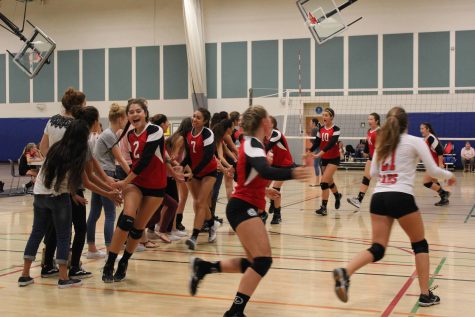 The girls celebrate their win after they won their third match. Photo taken by Skylar Todd.