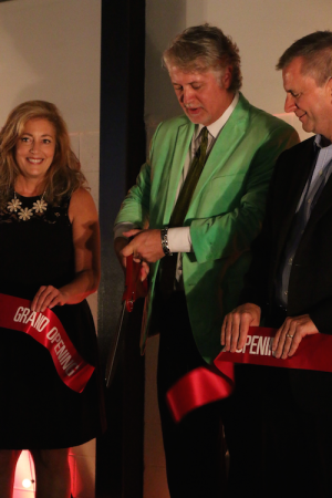 Marie Waldron, Cameron Curry, and Jed Wallace cut the ribbon in front of an anticipating audience. The event was host to many important speakers including Waldron, a state representative.