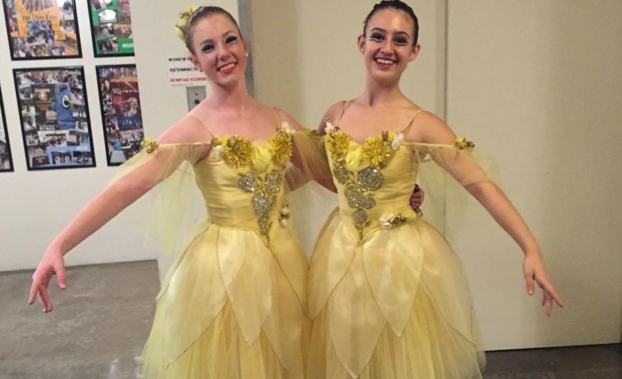 Dressed as a flower, Arielle Taylor (right) poses with a friend after a performance of the Nutcracker. In addition to dancing as an opening and closing flower, she played the part of a mouse in the show. Photo curtesy of Arielle Taylor. 