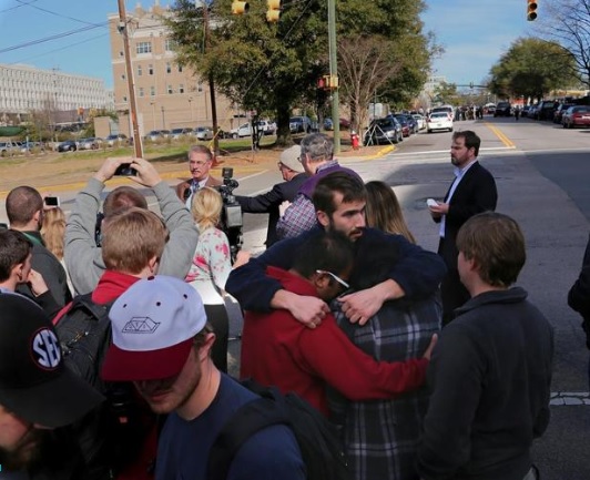 Students gather near the building of the shooting. Photo courtesy of The State.