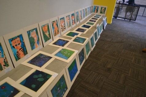 Student artwork lined up in Graduates Hall.