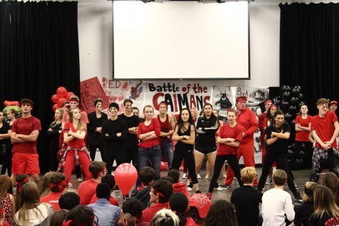 Both Red and Black Team finish off their dance with a pose