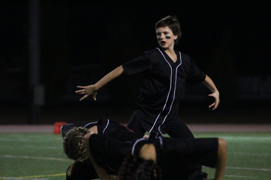 Feddock performs with Varsity Competition Dance at the first football CIF game of the season.