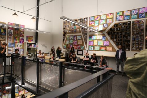 Students gather to listen to the imagined death of the Mars Rover. Photo credit Crystal Sung.