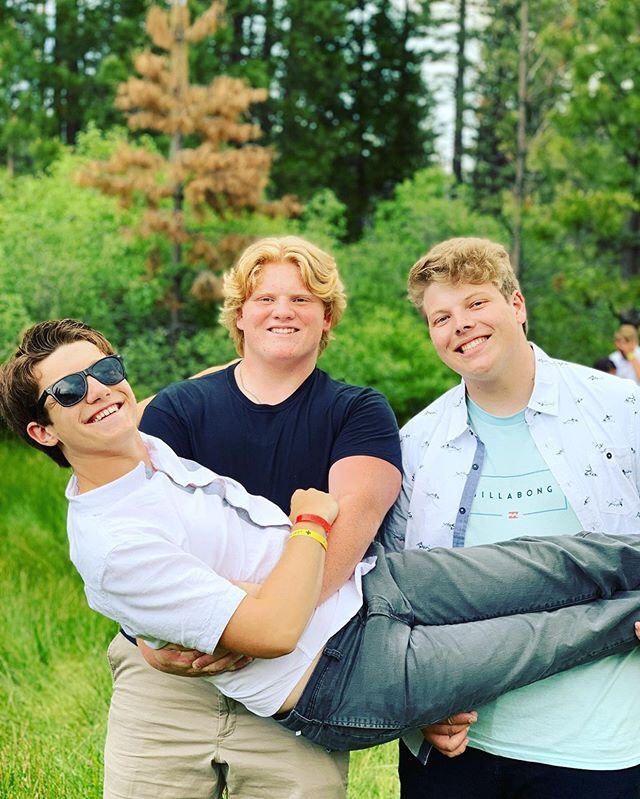 Jonah Staebell, Matthew Tillyer and Albert Pando pose at Hume Lake Summer Camps last summer.
